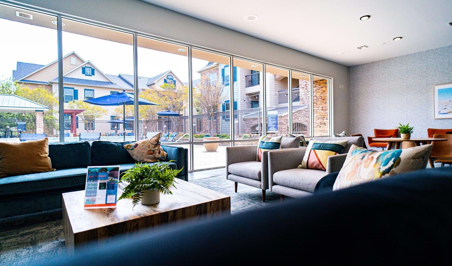 The essence of exceptional living a wall of windows in clubhouse