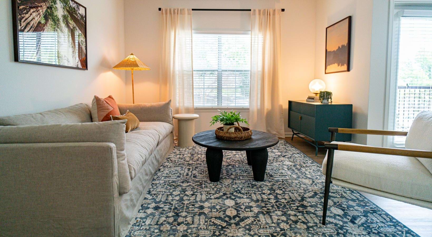 Beautiful living spaces with natural lighting a living room with a couch and a coffee table