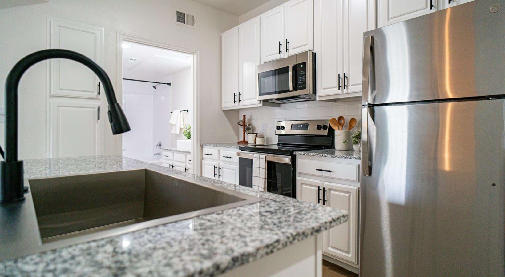 Beautiful kitchens with designer finishes spacious kitchen next to bathroom