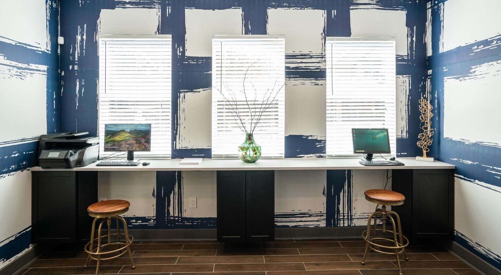 The essence of exceptional living business center with computer stations and printer