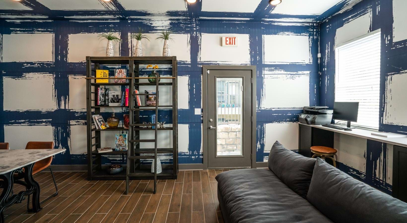 Take advantage of all The Reserve at Walnut Creek has to offer clubhouse with couch and bookshelf