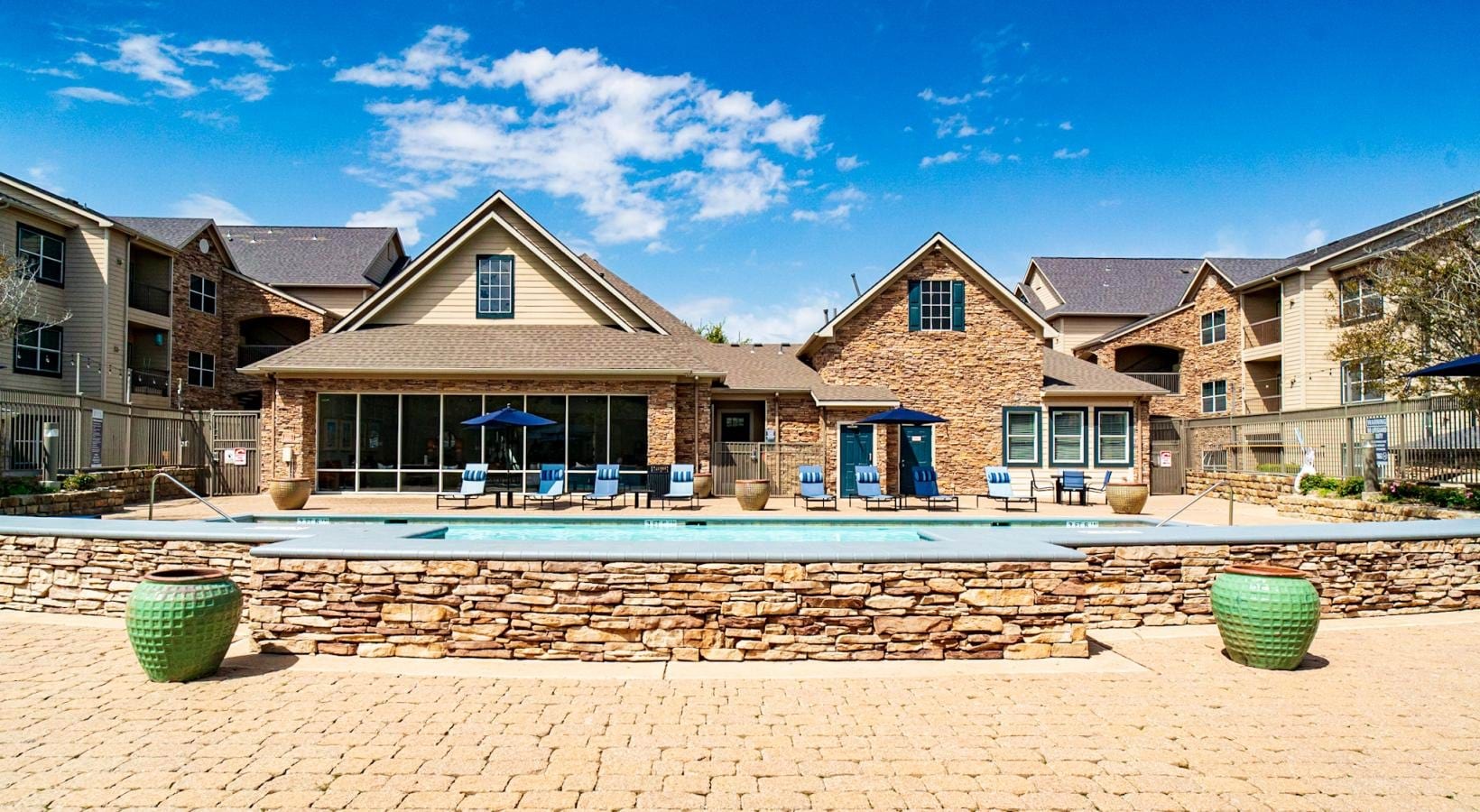 Shimmering resort-style pool outdoor swimming pool