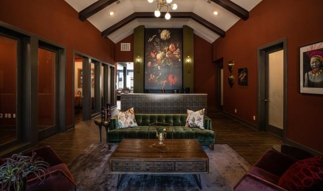 Everything within reach luxurious lounge with vaulted ceiling and recessed lighting