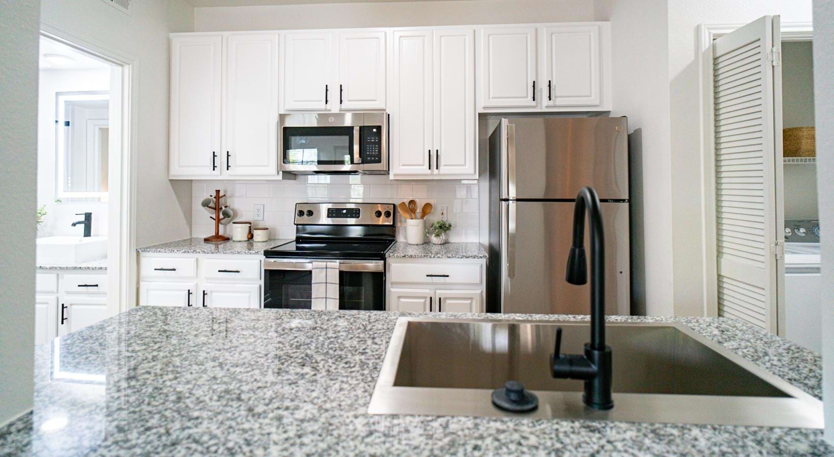Spacious kitchens with thoughtful details kitchen with laundry closet