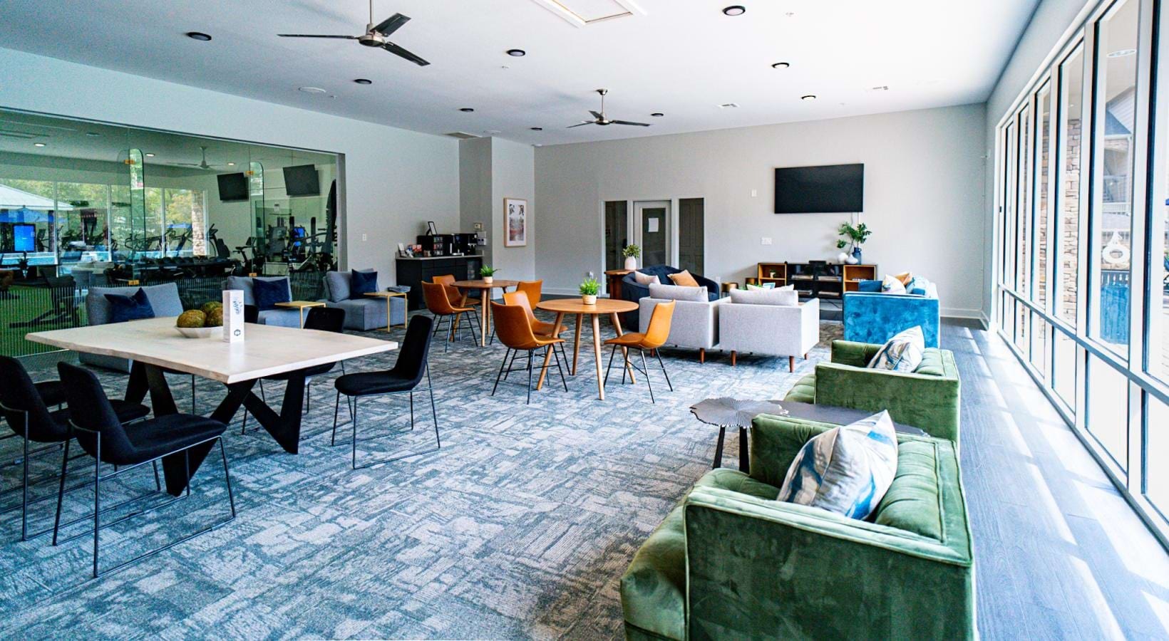 Enjoy our resident-only features clubhouse with glass wall looking into fitness center